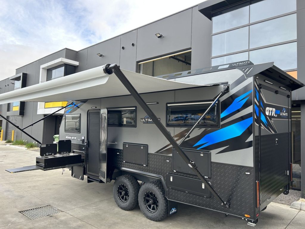 Slide-out kitchen unit fitted to caravan exterior, RV and trailer parts and accessories